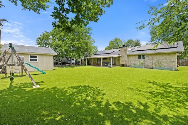 510 Heather Dr, Round Rock, TX 78664 - view of green lawn with a playground