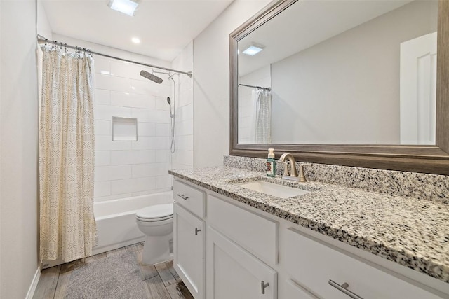 510 Heather Dr, Round Rock, TX 78664 - full bath with vanity, shower / bath combination with curtain, and wood finished floors
