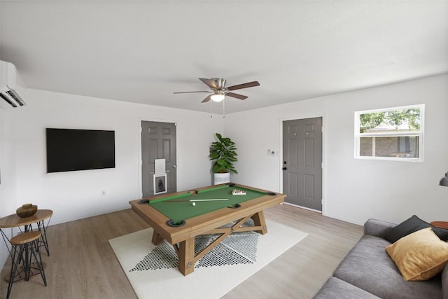 510 Heather Dr, Round Rock, TX 78664 - rec room with light wood-style flooring, billiards, a ceiling fan, and an AC wall unit
