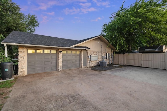 510 Heather Dr, Round Rock, TX 78664 - view of property exterior with driveway, a garage, a gate, and a shingled roof