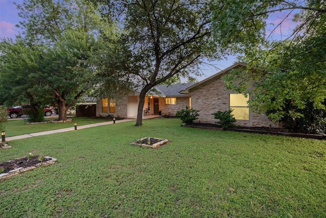 510 Heather Dr, Round Rock, TX 78664 - view of front of property featuring a front yard and stone siding