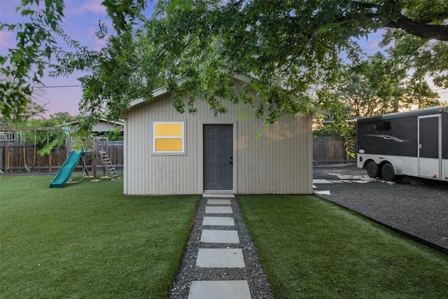 510 Heather Dr, Round Rock, TX 78664 - view of outbuilding featuring a fenced backyard and a playground