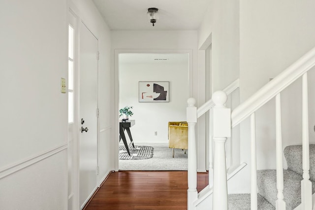 4009 Cordova Dr, Austin, TX 78759 - entryway featuring stairway, wood finished floors, and plenty of natural light