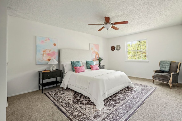 4009 Cordova Dr, Austin, TX 78759 - bedroom with carpet floors, a textured ceiling, and a ceiling fan