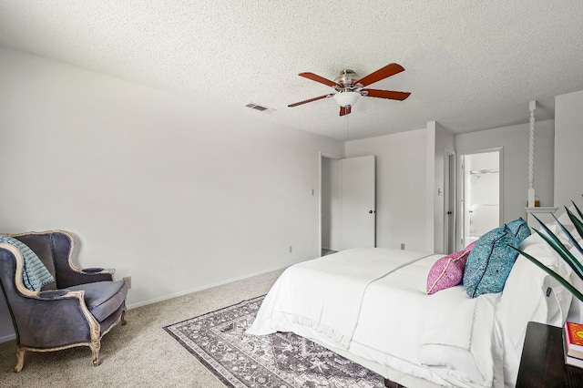 4009 Cordova Dr, Austin, TX 78759 - bedroom featuring carpet, a textured ceiling, and a ceiling fan