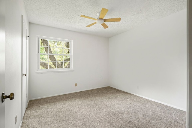4009 Cordova Dr, Austin, TX 78759 - empty room with light carpet, a textured ceiling, and a ceiling fan