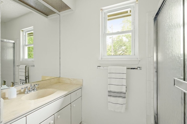 4009 Cordova Dr, Austin, TX 78759 - bathroom featuring a stall shower and vanity