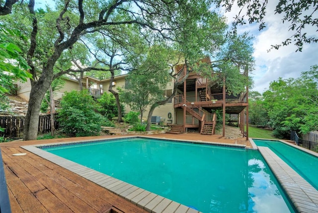 6605 Ladera Norte, Austin, TX 78731 - view of pool featuring a wooden deck and stairs