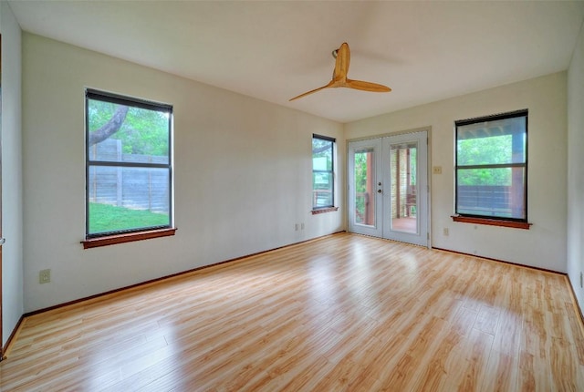6605 Ladera Norte, Austin, TX 78731 - empty room with wood finished floors and ceiling fan