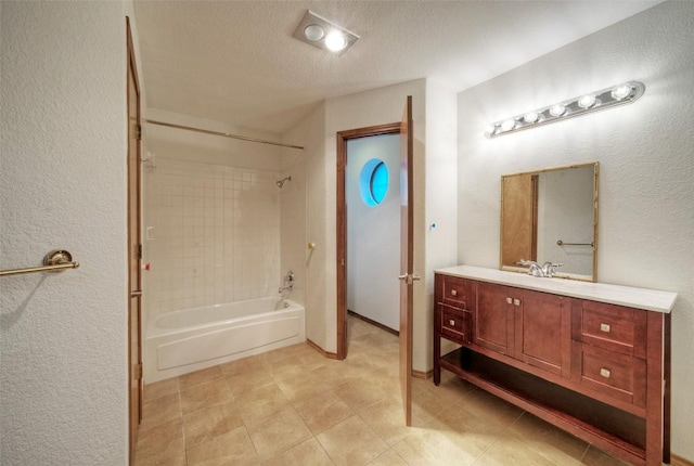 6605 Ladera Norte, Austin, TX 78731 - bathroom featuring  shower combination, vanity, a textured ceiling, and a textured wall