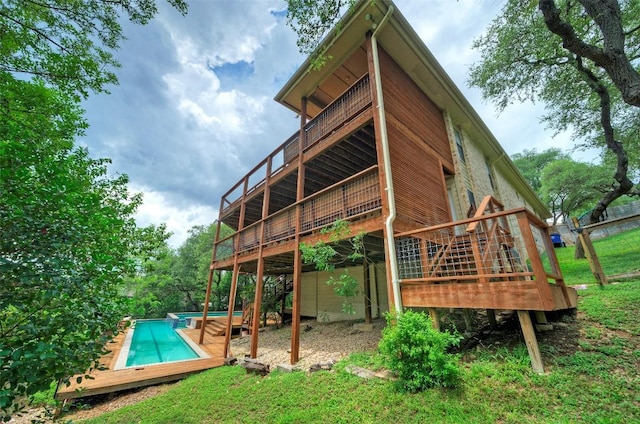 6605 Ladera Norte, Austin, TX 78731 - back of property with a wooden deck