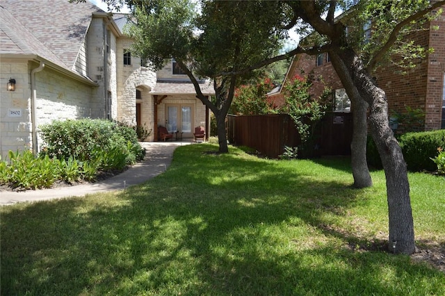 1802 Misty Ridge Dr, Leander, TX 78641 - view of yard featuring french doors and an attached garage