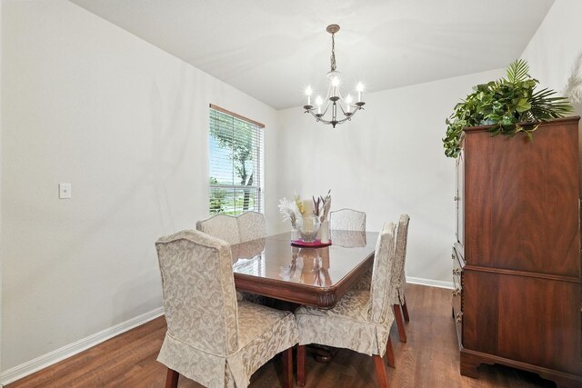1802 Misty Ridge Dr, Leander, TX 78641 - dining room featuring a chandelier and wood finished floors