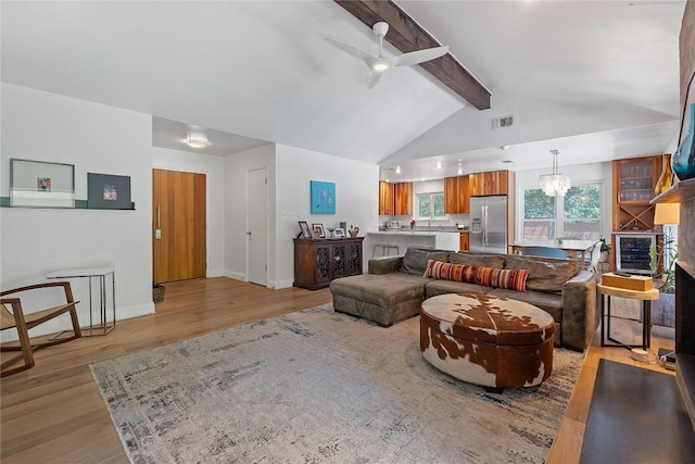 1407 Spring Gdn, Austin, TX 78746 - living area featuring ceiling fan, light wood-style floors, and wine cooler