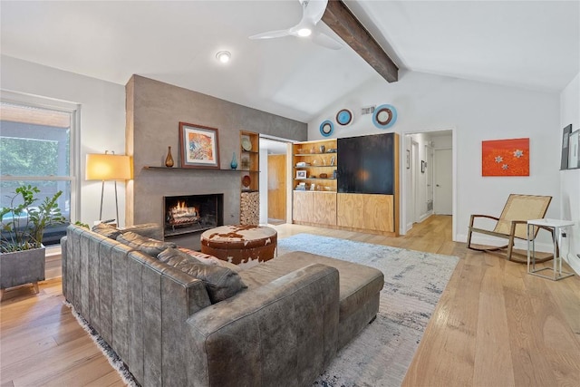 1407 Spring Gdn, Austin, TX 78746 - living room featuring a fireplace, light wood-style flooring, and a ceiling fan