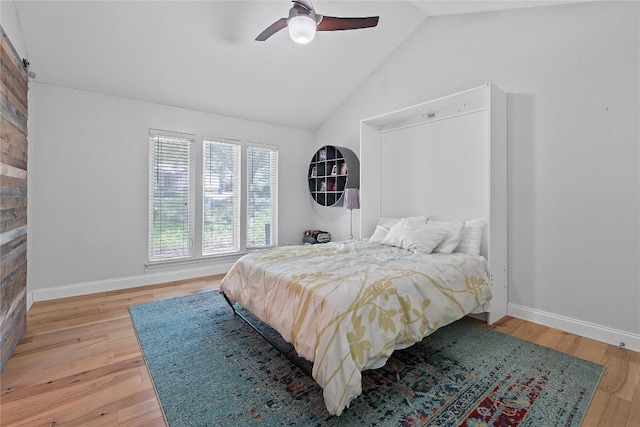 1407 Spring Gdn, Austin, TX 78746 - bedroom featuring lofted ceiling, wood finished floors, and a ceiling fan