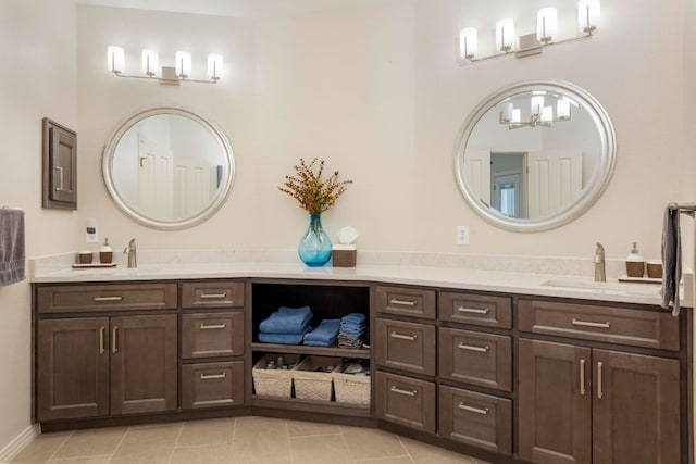 27 Stillmeadow Dr, The Hills, TX 78738 - full bath featuring vanity, tile patterned flooring, and a chandelier