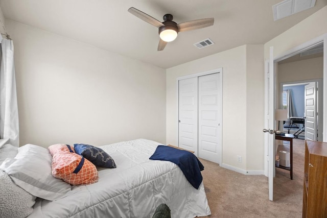 120 Hawkins Ct, Hutto, TX 78634 - bedroom with carpet flooring, a closet, and a ceiling fan