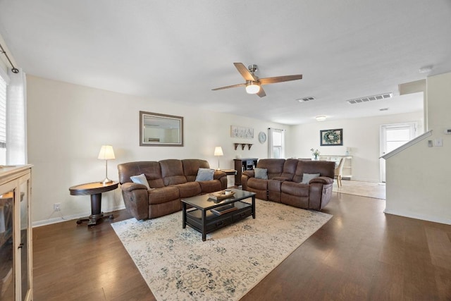 120 Hawkins Ct, Hutto, TX 78634 - living room featuring a ceiling fan and dark wood-style floors