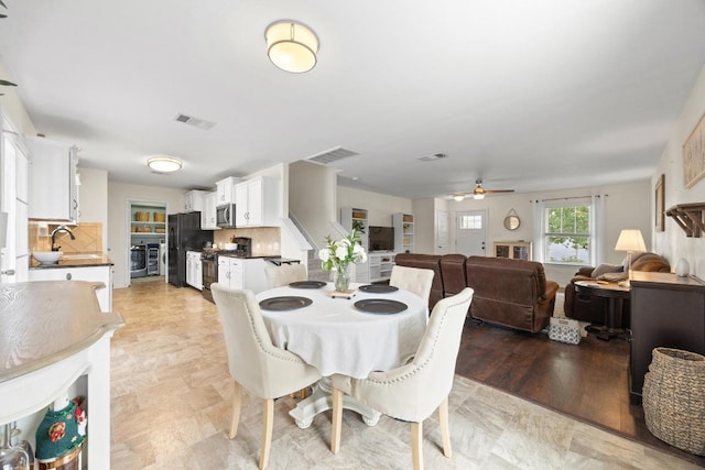 120 Hawkins Ct, Hutto, TX 78634 - dining area with ceiling fan