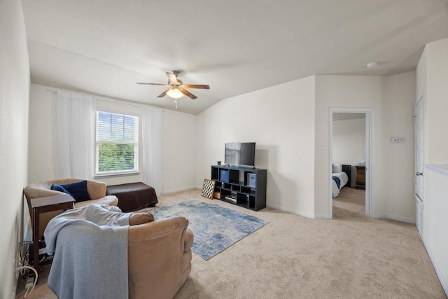 120 Hawkins Ct, Hutto, TX 78634 - living area with a ceiling fan, carpet flooring, and vaulted ceiling