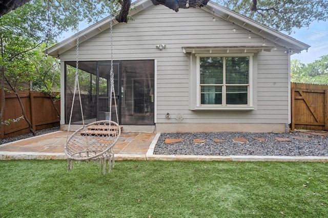 6116 Whipple Way, Austin, TX 78745 - back of property with a sunroom and a patio area