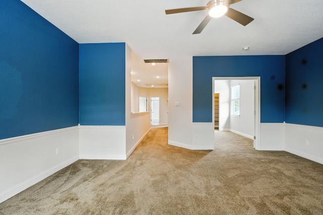 6116 Whipple Way, Austin, TX 78745 - spare room featuring a ceiling fan and carpet