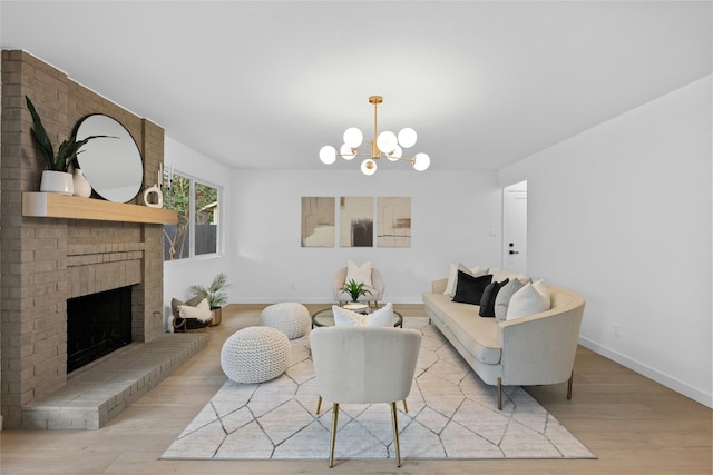 6721 Lost Vly, Austin, TX 78745 - living room featuring wood finished floors, a fireplace, and a chandelier