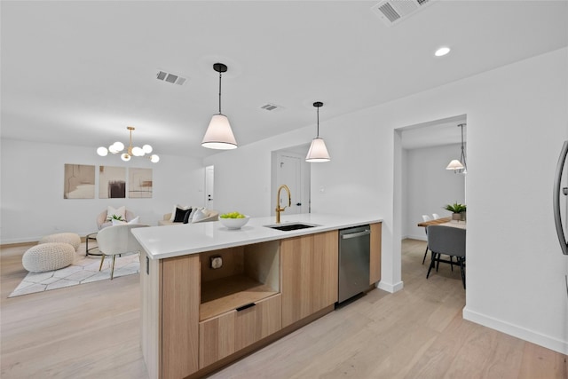 6721 Lost Vly, Austin, TX 78745 - kitchen featuring stainless steel dishwasher, modern cabinets, light wood-style flooring, light countertops, and recessed lighting