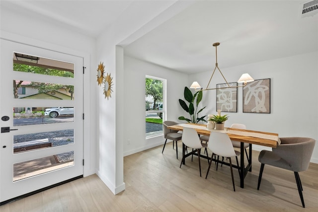 6721 Lost Vly, Austin, TX 78745 - dining room featuring light wood finished floors and baseboards