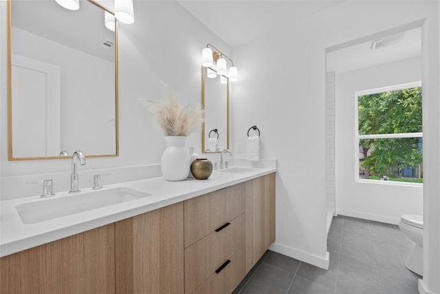 6721 Lost Vly, Austin, TX 78745 - full bath featuring double vanity and tile patterned floors