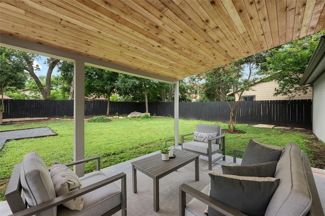 6721 Lost Vly, Austin, TX 78745 - fenced backyard featuring an outdoor hangout area and a patio