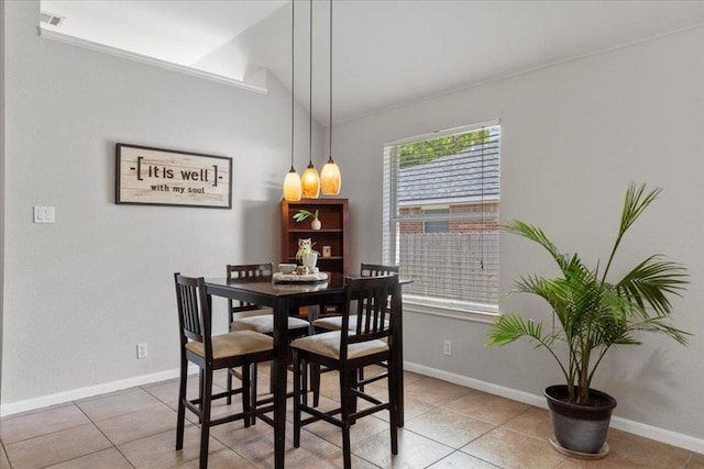 9012 Meacham Way, Austin, TX 78749 - dining area featuring light tile patterned flooring and baseboards