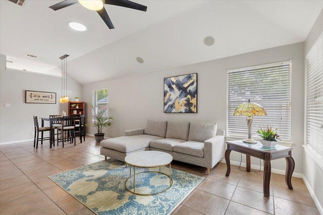 9012 Meacham Way, Austin, TX 78749 - living room with lofted ceiling, light tile patterned floors, and a ceiling fan