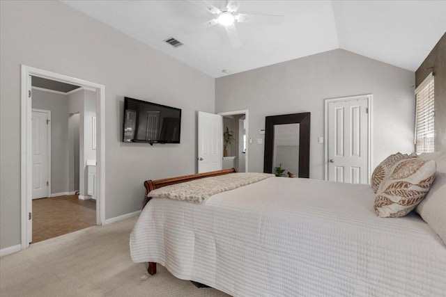 9012 Meacham Way, Austin, TX 78749 - bedroom with light carpet, lofted ceiling, a ceiling fan, and connected bathroom
