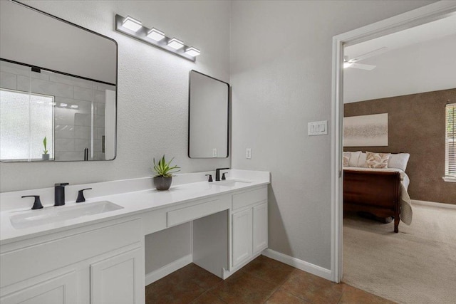 9012 Meacham Way, Austin, TX 78749 - full bathroom with double vanity, tile patterned floors, and ceiling fan
