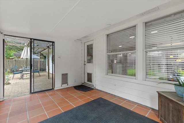 9012 Meacham Way, Austin, TX 78749 - unfurnished sunroom featuring outdoor dining space