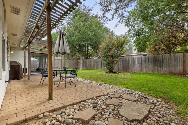 9012 Meacham Way, Austin, TX 78749 - fenced backyard with a pergola, area for grilling, a patio, and outdoor dining area