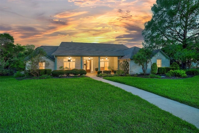 1500 El Cielo, Leander, TX 78641 - view of front facade with a front yard, a porch, and roof with shingles