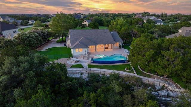 1500 El Cielo, Leander, TX 78641 - aerial view at dusk of view of pool area and a residential view