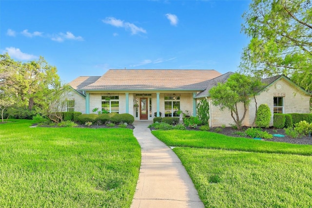 1500 El Cielo, Leander, TX 78641 - ranch-style home with a front lawn, covered porch, and stucco siding
