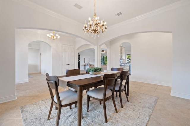 1500 El Cielo, Leander, TX 78641 - dining space featuring arched walkways, a chandelier, ornamental molding, and light tile patterned flooring