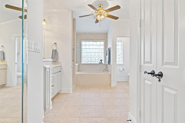 1500 El Cielo, Leander, TX 78641 - bathroom featuring a ceiling fan, a garden tub, vanity, tile patterned flooring, and lofted ceiling