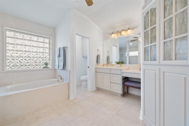 1500 El Cielo, Leander, TX 78641 - bathroom with ceiling fan, a garden tub, vanity, tile patterned floors, and ornamental molding