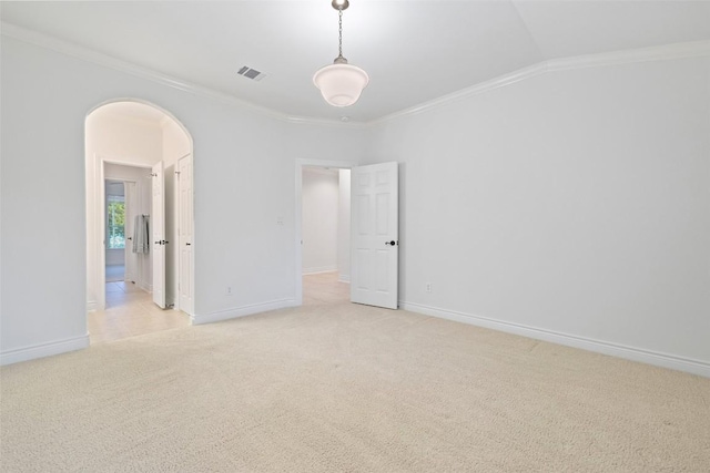 1500 El Cielo, Leander, TX 78641 - unfurnished bedroom with light carpet, arched walkways, crown molding, and lofted ceiling