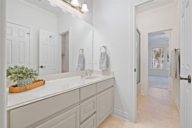 1500 El Cielo, Leander, TX 78641 - full bath featuring ornamental molding, vanity, tile patterned floors, and a shower with shower door