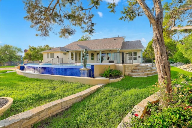 1500 El Cielo, Leander, TX 78641 - rear view of house featuring a yard and stucco siding
