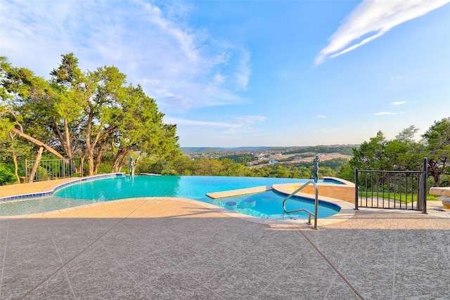 1500 El Cielo, Leander, TX 78641 - view of pool featuring a patio area and a pool with connected hot tub