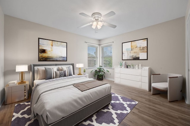 11705 Oak Trl, Austin, TX 78753 - bedroom featuring wood finished floors and ceiling fan