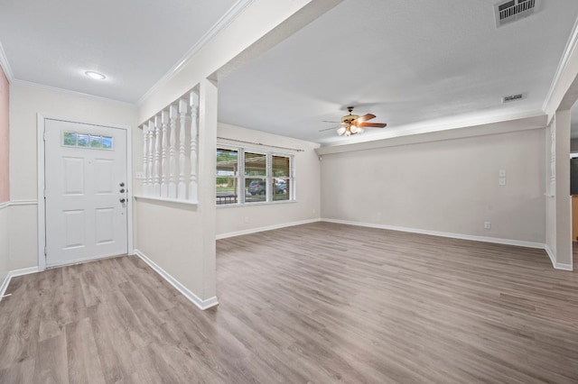 11705 Oak Trl, Austin, TX 78753 - entrance foyer featuring wood finished floors, crown molding, a ceiling fan, and recessed lighting